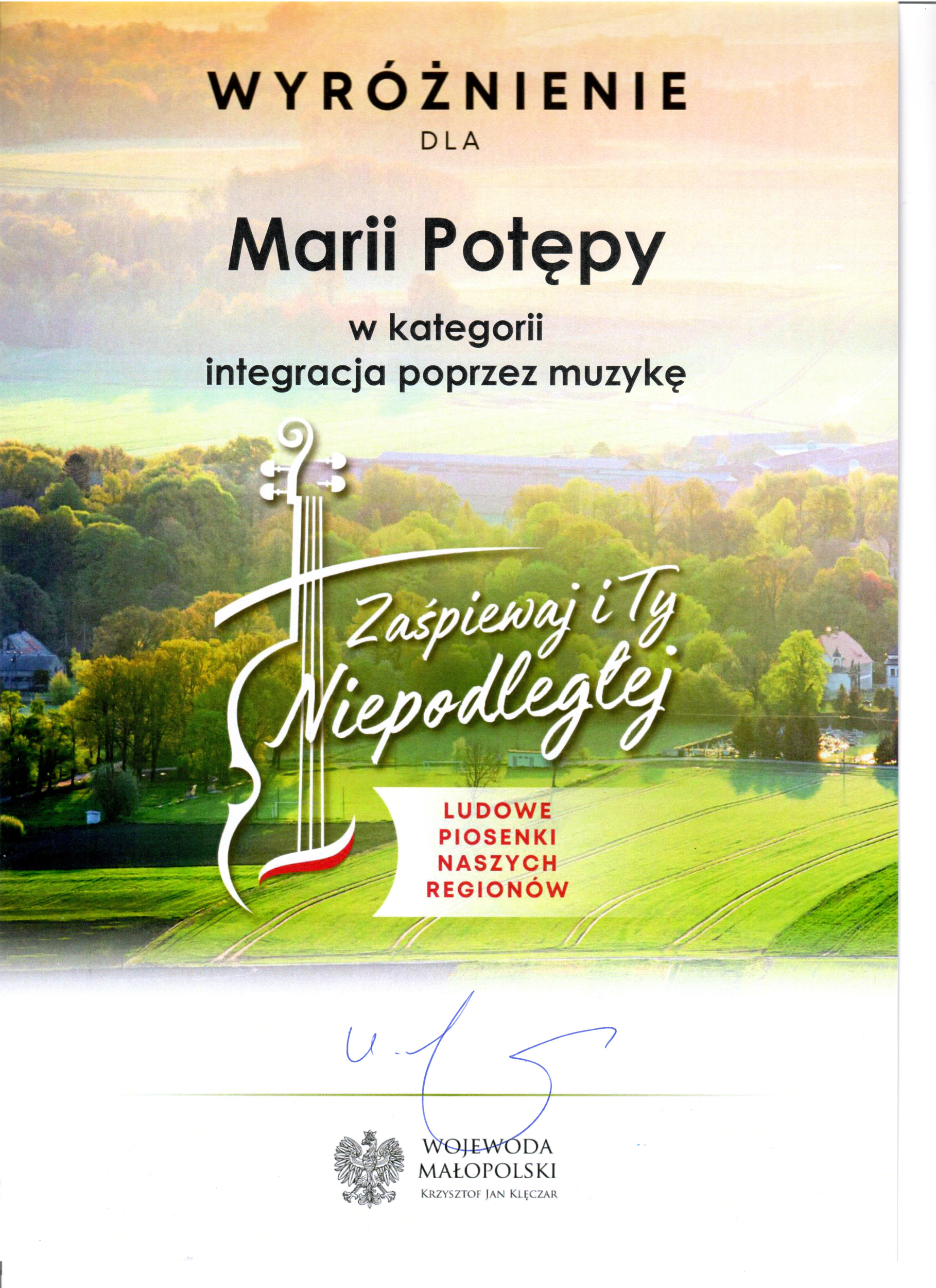 Dyplom wyróżnienia dla Marii Potępy w kategorii "integracja poprzez muzykę" w ramach projektu "Zaśpiewaj i Ty Niepodległej" podpisany przez Wojewodę Małopolskiego.